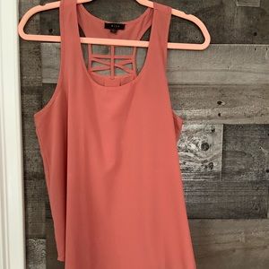 Terracotta sleeveless blouse with cutout detail